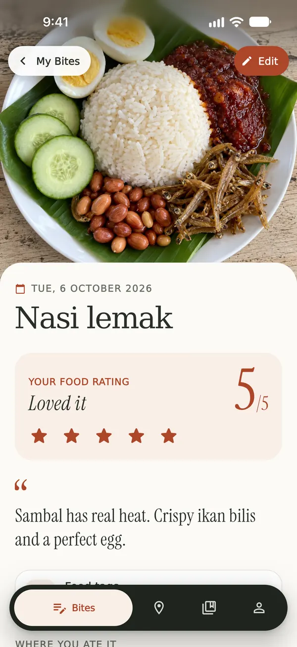 A nasi lemak bite with a large photo, a five out of five food rating, Loved it, and the note “Sambal has real heat. Crispy ikan bilis and a perfect egg.”